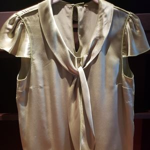 Dolce and Gabbana light green blouse.